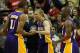 HOUSTON, TX - NOVEMBER 07: Steve Blake #5 of the Los Angeles Lakers celebrates with his teammates after his game-winning three point shot en route to a 99-98 defeat of the Houston Rockets during the game at Toyota Center on November 7, 2013 in Houston, T