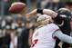 Nov 9, 2013; Winston-Salem, NC, USA; Florida State Seminoles linebacker Christian Jones (7) hits Wake Forest Demon Deacons quarterback Tanner Price (10) during the first quarter at BB&T Field. Mandatory Credit: Jeremy Brevard-USA TODAY Sports