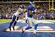 EAST RUTHERFORD, NJ - OCTOBER 21: Wide receiver Victor Cruz #80 of the New York Giants cannot control the ball as cornerback Josh Robinson #21 of the Minnesota Vikings defends during a game at MetLife Stadium on October 21, 2013 in East Rutherford, New Je