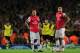 LONDON, ENGLAND - OCTOBER 22: Mesut Ozil and Olivier Giroud of Arsenal react after Robert Lewandowski of Borussia Dortmund (not pictured) scored their second goal during the UEFA Champions League Group F match between Arsenal and Borussia Dortmund at Em