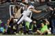 OAKLAND, CA - NOVEMBER 03: Wide receiver Riley Cooper #14 of the Philadelphia Eagles pulls in a touchdown catch against the Oakland Raiders in the second quarter on November 3, 2013 at O.co Coliseum in Oakland, California. (Photo by Brian Bahr/Getty Ima