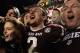 COLLEGE STATION, TX - NOVEMBER 09: Johnny Manziel #2 of the Texas A&M Aggies celebrates with fans after the Aggies defeated the Mississippi State Bulldogs 51-41 at Kyle Field on November 9, 2013 in College Station, Texas. (Photo by Scott Halleran/Getty