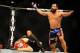 Dec 30, 2011; Las Vegas, NV, USA; UFC fighter Johny Hendricks (right) celebrates after defeating Jon Fitch during a welterweight bout at UFC 141 at the MGM Grand Garden event center. Mandatory Credit: Mark J. Rebilas-USA TODAY Sports