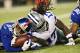 ARLINGTON, TX - SEPTEMBER 8: Jayron Hosley #28 of the New York Giants and Dwayne Harris #17 of the Dallas Cowboys go after a fumble at AT&T Stadium on September 8, 2013 in Arlington, Texas. The Cowboys defeated the Giants 31-36. (Photo by Wesley Hitt/G