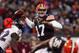 CLEVELAND, OH - NOVEMBER 03: Quarterback Jason Campbell #17 of the Cleveland Browns throws to a receiver as he is pressured by safety James Ihedigbo #32 of the Baltimore Ravens at FirstEnergy Stadium on November 3, 2013 in Cleveland, Ohio. (Photo by Mat