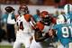 Oct 31, 2013; Miami Gardens, FL, USA; Cincinnati Bengals quarterback Andy Dalton (14) passes the ball against the Cincinnati Bengals in the first quarter at Sun Life Stadium. Mandatory Credit: Robert Mayer-USA TODAY Sports