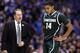 INDIANAPOLIS, IN - MARCH 29: Gary Harris #14 of the Michigan State Spartans walks on court with his head down past head coach Tom Izzo in the second half against the Duke Blue Devils during the Midwest Region Semifinal round of the 2013 NCAA Men's Basket