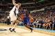 CHARLOTTE, NC - NOVEMBER 8: Iman Shumpert #21 of the New York Knicks drives against Cody Zeller #40 of the Charlotte Bobcats at the Time Warner Cable Arena on November 8, 2013 in Charlotte, North Carolina. NOTE TO USER: User expressly acknowledges and ag