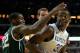 CHICAGO, IL - NOVEMBER 12: Julius Randle #30 of the Kentucky Wildcats tries to move against Branden Dawson #22 of the Michigan State Spartans during the State Farm Champions Classic at the United Center on November 12, 2013 in Chicago, Illinois. (Photo b