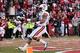 Nov 2, 2013; Fayetteville, AR, USA; Auburn Tigers running back Tre Mason (21) scores a touchdown against the Arkansas Razorbacks during the first quarter at Donald W. Reynolds Razorback Stadium. Mandatory Credit: Nelson Chenault-USA TODAY Sports