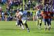 Oct 26, 2013; Charlottesville, VA, USA; Georgia Tech Yellow Jackets running back David Sims (20) scores a touchdown with 1:55 left in the fourth quarter as Virginia Cavaliers safety Rijo Walker (27) and safety Anthony Harris (8) and defensive end Max Vall