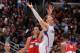 LOS ANGELES, CA - FEBRUARY 15: Blake Griffin #32 of the Los Angeles Clippers loses the ball on his way to the basket against JaVale McGee #34 of the Washington Wizards at Staples Center on February 15, 2012 in Los Angeles, California. NOTE TO USER: User