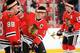 DETROIT - DECEMBER 06: Jonathan Towes #19, Patrick Kane #88 and Patrick Sharp #10 of the Chicago Blackhawks wear the Winter Classic touque during warmups before a NHL game against the Detroit Red Wings on December 6, 2008 at Joe Louis Arena in Detroit, M