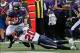 Sep 22, 2013; Baltimore, MD, USA; Houston Texans safety Ed Reed (20) tackles Baltimore Ravens tight end Dallas Clark (87) after a reception at M&T Bank Stadium. Mandatory Credit: Mitch Stringer-USA TODAY Sports
