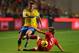 LISBON, PORTUGAL - NOVEMBER 15: Alexander Kacaniklic of Sweden gets past Fabio Coentrao of Portugal during the FIFA 2014 World Cup Qualifier Play-off First Leg between Portugal and Sweden at Estadio da Luz on November 15, 2013 in Lisbon, Portugal. (Phot