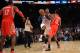 NEW YORK, NY - NOVEMBER 14: A personal foul is called on James Harden #13 of the Houston Rockets while Carmelo Anthony #7 of the New York Knicks takes a shot with five seconds left in the game at Madison Square Garden on November 14, 2013 in New York Ci