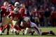 SAN FRANCISCO, CA - OCTOBER 13: Frank Gore #21 of the San Francisco 49ers is tackled by Calais Campbell #93 of the Arizona Cardinals at Candlestick Park on October 13, 2013 in San Francisco, California. (Photo by Ezra Shaw/Getty Images)