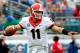 JACKSONVILLE, FL - NOVEMBER 02: Aaron Murray #11 of the Georgia Bulldogs attempts a pass during the game against the Florida Gators at EverBank Field on November 2, 2013 in Jacksonville, Florida. (Photo by Sam Greenwood/Getty Images)