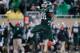 EAST LANSING, MI - NOVEMBER 02: Denicos Allen #28 of the Michigan State Spartans celebrates a third-quarter sack against the Michigan Wolverines at Spartan Stadium on November 2, 2013 in East Lansing, Michigan. Michigan State won the game 29-6. (Photo by