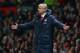 MANCHESTER, ENGLAND - NOVEMBER 10: Arsenal Manager Arsene Wenger reacts during the Barclays Premier League match between Manchester United and Arsenal at Old Trafford on November 10, 2013 in Manchester, England. (Photo by Alex Livesey/Getty Images)