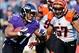 Nov 10, 2013; Baltimore, MD, USA; Baltimore Ravens running back Ray Rice (27) runs with the ball as Cincinnati Bengals linebacker Vincent Rey (57) defends at M&T Bank Stadium. Mandatory Credit: Evan Habeeb-USA TODAY Sports