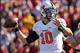 Oct 26, 2013; Ames, IA, USA; Oklahoma State Cowboys quarterback Clint Chelf (10) throws during the first quarter against the Iowa State Cyclones at Jack Trice Stadium. Mandatory Credit: Brace Hemmelgarn-USA TODAY Sports