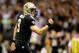 NEW ORLEANS, LA - NOVEMBER 10: Quarterback Drew Brees #9 of the New Orleans Saints celebrates a second quarter touchdown against the Dallas Cowboys during a game at the Mercedes-Benz Superdome on November 10, 2013 in New Orleans, Louisiana. (Photo by Ro