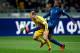 KIEV, UKRAINE - NOVEMBER 15: Roman Zozulya of Ukraine (L) fights for the ball with Eric Abidal of France (R) during the FIFA 2014 World Cup Qualifier Play-off First Leg between Ukraine and France at the Olympic Stadium on November 15, 2013 in Kiev, Ukrai
