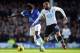 LIVERPOOL, ENGLAND - NOVEMBER 03: Romelu Lukaku of Everton in action with Sandro of Tottenham Hotspur during the Barclays Premier League match between Everton and Tottenham Hotspur at Goodison Park on November 03, 2013 in Liverpool, England. (Photo by Chr