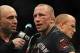 Nov 16, 2013; Las Vegas, NV, USA; Georges St-Pierre is interviewed by Joe Rogan after his welterweight championship bout against Johny Hendricks during UFC 167 at MGM Grand Garden Arena. Mandatory Credit: Stephen R. Sylvanie-USA TODAY Sports