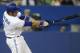 TORONTO, CANADA - AUGUST 30: J.P. Arencibia #9 of the Toronto Blue Jays bats during an MLB game against the Kansas City Royals August 30, 2013 at Rogers Centre in Toronto, Ontario, Canada. (Photo by Brad White/Getty Images)