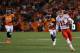 DENVER, CO - NOVEMBER 17: Alex Smith #11 of the Kansas City Chiefs runs for a first down in the secind quarter against the Denver Broncos at Sports Authority Field at Mile High on November 17, 2013 in Denver, Colorado. (Photo by Justin Edmonds/Getty Im
