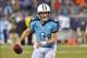 Nov 14, 2013; Nashville, TN, USA; Tennessee Titans quarterback Ryan Fitzpatrick (4) scrambles against the Indianapolis Colts during the first half at LP Field. Mandatory Credit: Jim Brown-USA TODAY Sports
