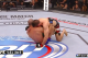 The sweep fails, but Lawler is no longer flat on his back, making it near impossible for MacDonald to use his ground-and-pound effectively.