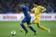 KIEV, UKRAINE - NOVEMBER 15: Ukraine's Artem Fedetskiy (R) fights for the ball with Franck Ribery (L) of France during the FIFA 2014 World Cup Qualifier Play-off First Leg soccer match between Ukraine and France at the Olympic Stadium on November 15, 2013