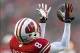 Nov 16, 2013; Madison, WI, USA; Wisconsin Badgers cornerback Sojourn Shelton (8) intercepts a pass during the first quarter against the Indiana Hoosiers at Camp Randall Stadium. Mandatory Credit: Jeff Hanisch-USA TODAY Sports