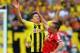 LONDON, ENGLAND - MAY 25: Robert Lewandowski of Borussia Dortmund (L) in action with Franck Ribery of Bayern Muenchen during the UEFA Champions League final match between Borussia Dortmund and FC Bayern Muenchen at Wembley Stadium on May 25, 2013 in Lond