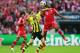 LONDON, ENGLAND - MAY 25: Robert Lewandowski of Borussia Dortmund (L) in action with David Alaba of Bayern Muenchen during the UEFA Champions League final match between Borussia Dortmund and FC Bayern Muenchen at Wembley Stadium on May 25, 2013 in London