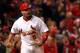 ST LOUIS, MO - OCTOBER 27: Albert Pujols #5 of the St. Louis Cardinals celebrates after scoring on a game-tying two-run triple by David Freese #23 in the ninth inning during Game Six of the MLB World Series against the Texas Rangers at Busch Stadium on O