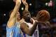 Nov 18, 2013; Oklahoma City, OK, USA; Oklahoma City Thunder point guard Reggie Jackson (15) attempts a shot against Denver Nuggets center Timofey Mozgov (25) during the third quarter at Chesapeake Energy Arena. Mandatory Credit: Mark D. Smith-USA TODAY Sp
