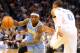 Nov 18, 2013; Oklahoma City, OK, USA; Denver Nuggets point guard Ty Lawson (3) handles the ball against Oklahoma City Thunder point guard Russell Westbrook (0) during the second quarter at Chesapeake Energy Arena. Mandatory Credit: Mark D. Smith-USA TODAY