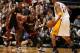 MIAMI, FL - MARCH 10: Dwyane Wade #3 of the Miami Heat defends against Kobe Bryant #24 of the Los Angeles Lakers as LeBron James #6 watches on March 10, 2011 at American Airlines Arena in Miami, Florida. NOTE TO USER: User expressly acknowledges and agre