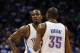Apr 21, 2013; Oklahoma City, OK, USA; Oklahoma City Thunder forward Kevin Durant (35) talks to Thunder forward Serge Ibaka (9) during a break in action against the Houston Rockets in the second half during game one of the first round of the 2013 NBA Playo