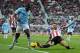 SUNDERLAND, ENGLAND - NOVEMBER 10: Micah Richards of Manchester City is challenged by Phillip Bardsley of Sunderland during the Barclays Premier League match between Sunderland and Manchester City at the Stadium of Light on November 10, 2013 in Sunderland