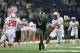 ARLINGTON, TX - NOVEMBER 16: Antwan Goodley #5 of the Baylor Bears makes a pass reception against Tanner Jacobson #20 and Keenon Ward #15 of the Texas Tech Red Raiders at AT&T Stadium on November 16, 2013 in Arlington, Texas. (Photo by Ronald Martinez/G
