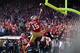 SAN FRANCISCO, CA - JANUARY 14: Michael Crabtree #15 of the San Francisco 49ers celebrates after scoring a touchdown in the first quarter against the New Orleans Saints during the NFC Divisional playoff game at Candlestick Park on January 14, 2012 in San