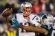 Nov 18, 2013; Charlotte, NC, USA; New England Patriots quarterback Tom Brady (12) throws a pass during the third quarter against the Carolina Panthers at Bank of America Stadium. The Panthers defeated the Patriots 24-20. Mandatory Credit: Jeremy Brevard-U