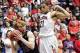 Nov 18, 2013; Tucson, AZ, USA; Fairleigh Dickinson Knights forward Mathias Seilund (22) prepares to pass as he is defended by Arizona Wildcats forward Brandon Ashley (21) during the second half at McKale Center. Mandatory Credit: Casey Sapio-USA TODAY Spo