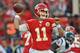 KANSAS CITY, MO - OCTOBER 20: Quarterback Alex Smith #11 of the Kansas City Chiefs throws a pass against the Houston Texans during the first half on October 20, 2013 at Arrowhead Stadium in Kansas City, Missouri. (Photo by Peter Aiken/Getty Images)