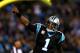 CHARLOTTE, NC - NOVEMBER 18: Cam Newton #1 of the Carolina Panthers reacts after throwing for a touchdown against the New England Patriots during their game at Bank of America Stadium on November 18, 2013 in Charlotte, North Carolina. (Photo by Streeter